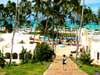 Emma Harrop - wandering through Dreams of Zanzibar Resort down to the beach